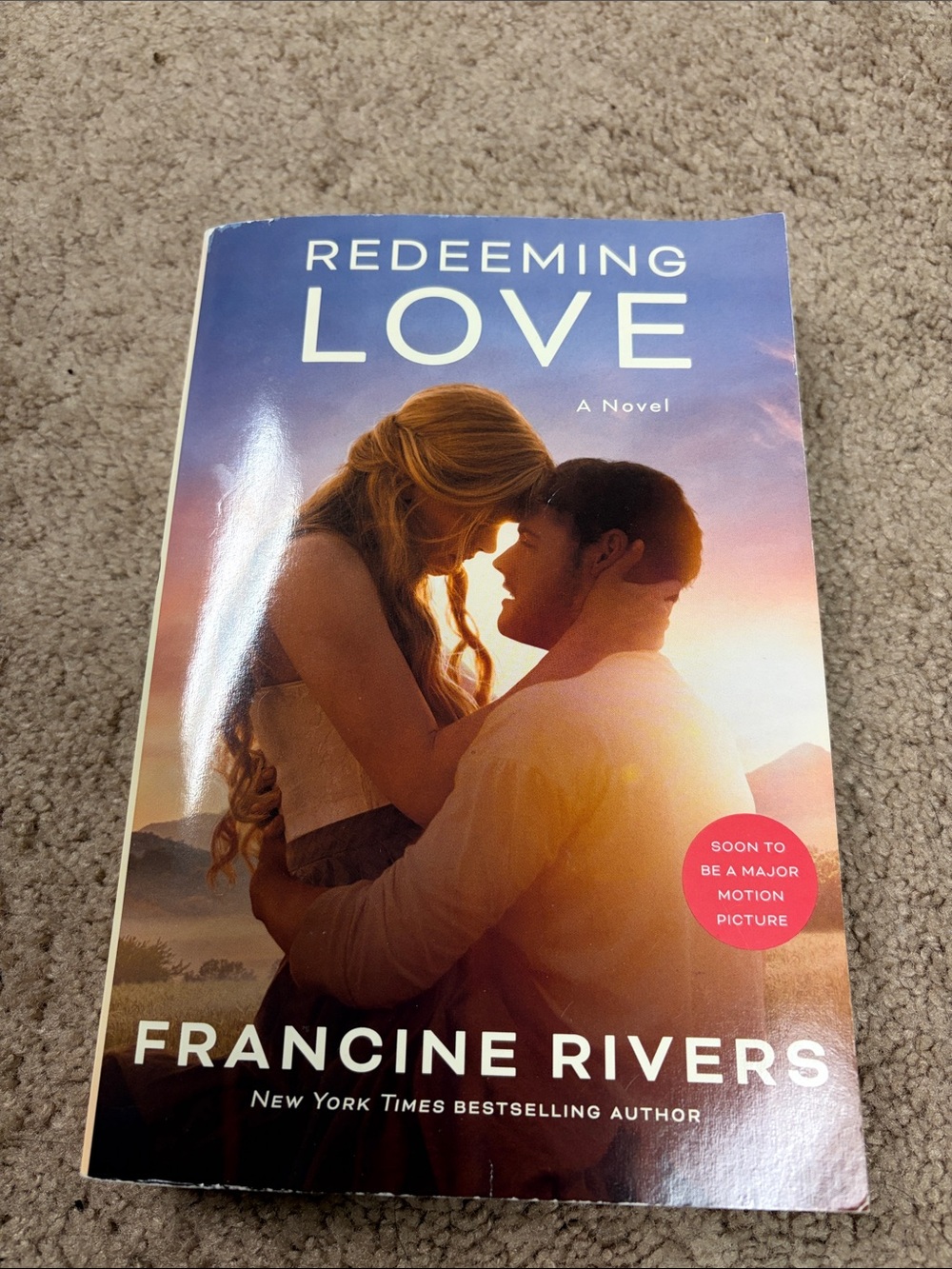 Redeeming Love Paperback Book - Sunset Cover (Orange, Purple)